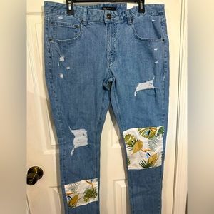 International Concept I.N.C 36W Denim Pants with floral patterns.